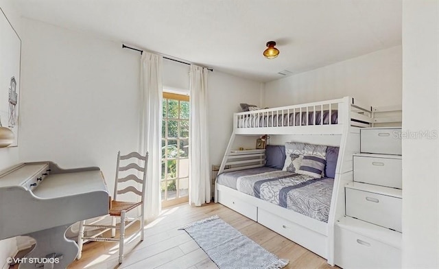 bedroom with light wood-type flooring