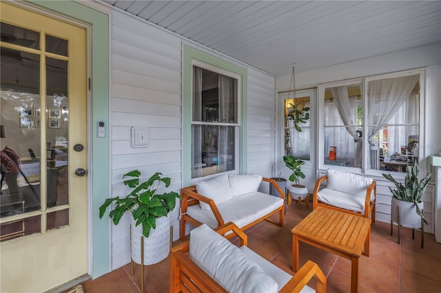 sunroom / solarium with wood ceiling