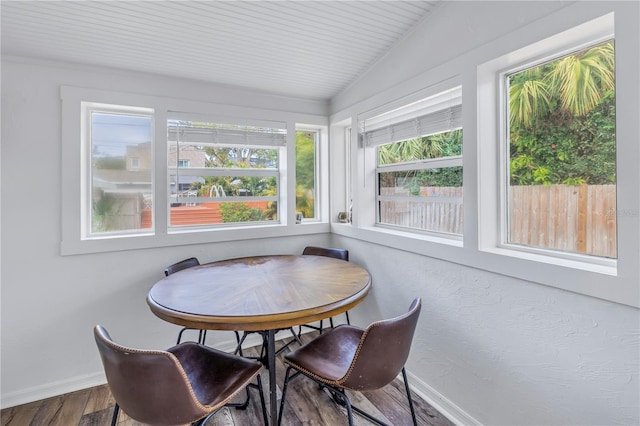 sunroom / solarium with lofted ceiling