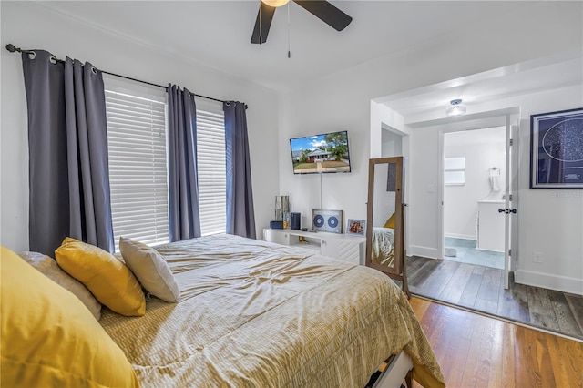 bedroom featuring hardwood / wood-style flooring and ceiling fan