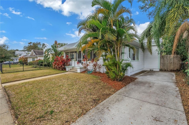 view of front of property with covered porch and a front yard