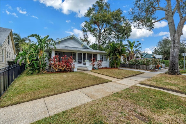 view of front of home with a porch and a front yard