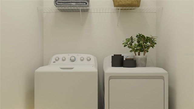 laundry room with independent washer and dryer