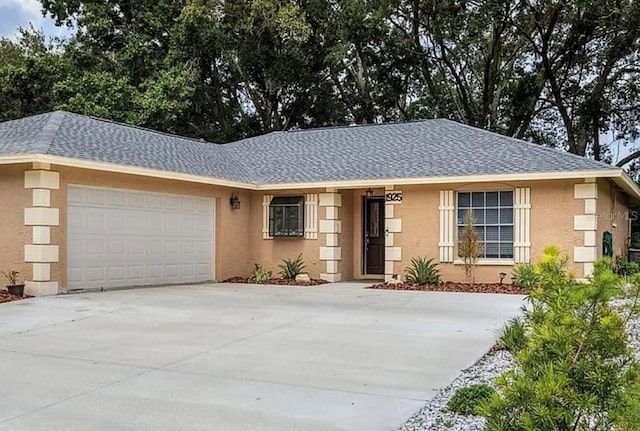 single story home with a garage