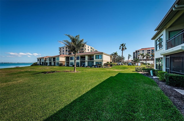 view of yard with a water view