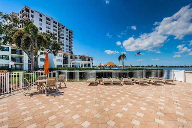 view of patio featuring a water view