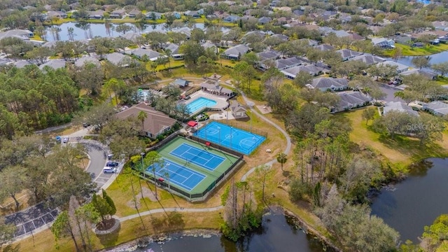 birds eye view of property featuring a water view