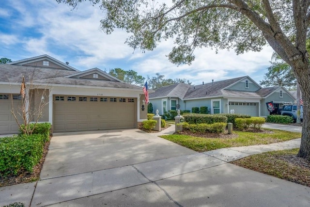 single story home featuring a garage