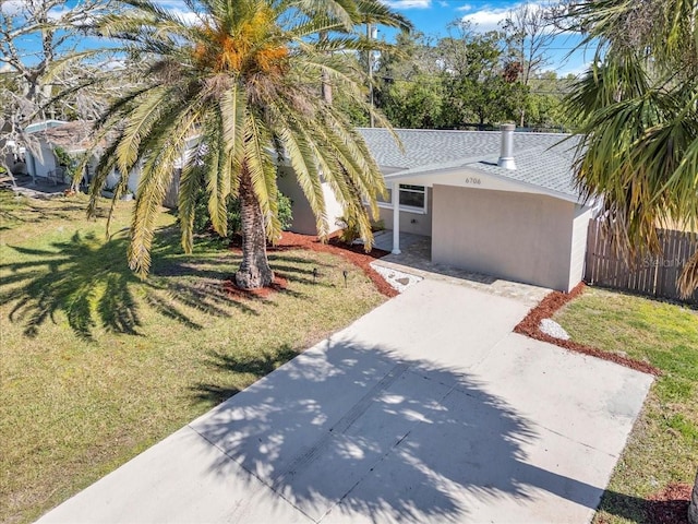 view of front of home featuring a front lawn