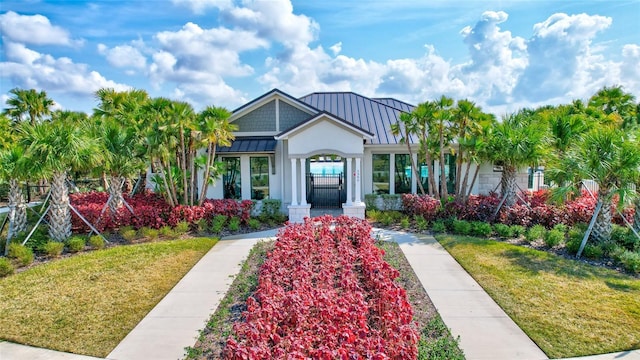 view of front of home with a front lawn