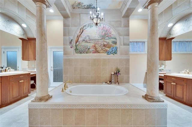 bathroom with vanity, crown molding, and decorative columns