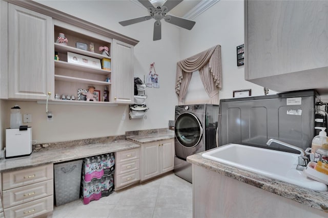 washroom featuring sink, cabinets, ornamental molding, light tile patterned floors, and ceiling fan