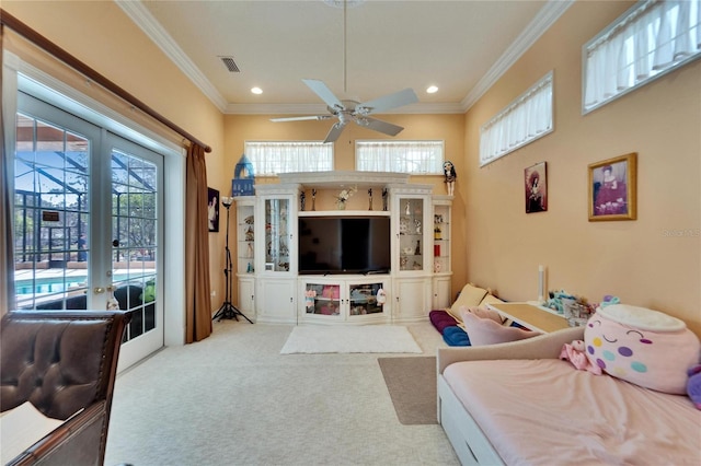 living room with crown molding, ceiling fan, light carpet, and french doors