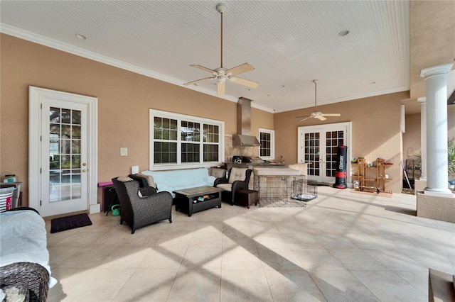 view of patio / terrace featuring outdoor lounge area, an outdoor bar, ceiling fan, and exterior kitchen