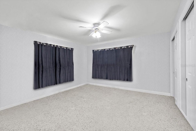 spare room featuring ceiling fan