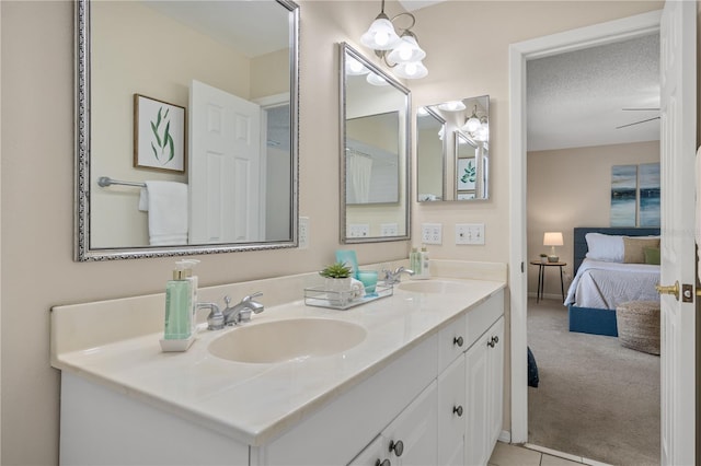 bathroom featuring vanity and a textured ceiling