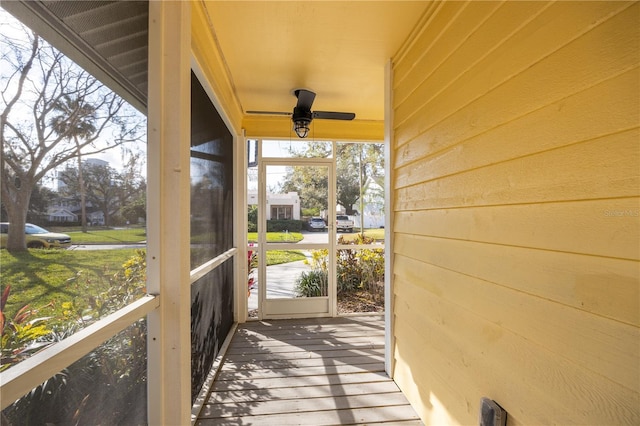 exterior space featuring ceiling fan