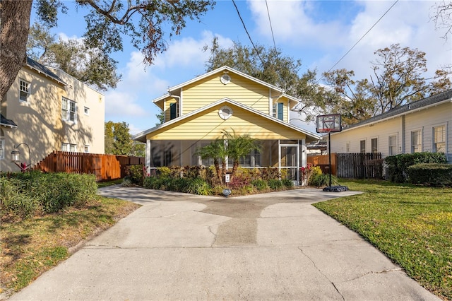 view of front of home with a front lawn