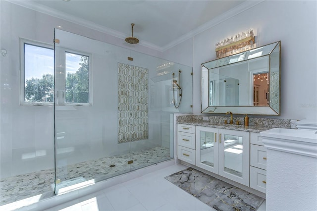 bathroom with a shower stall, ornamental molding, and vanity