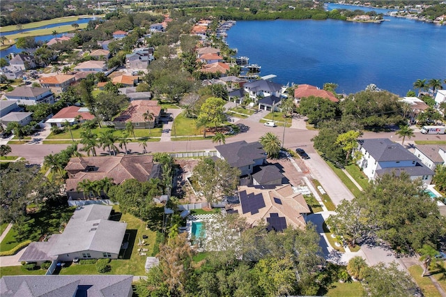 aerial view with a residential view and a water view