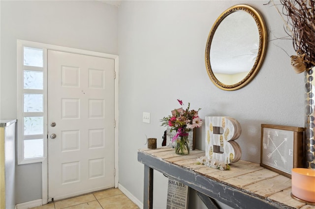 entryway featuring light tile patterned flooring