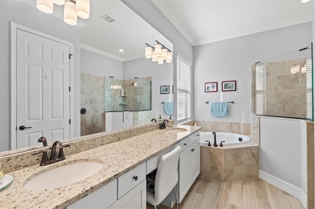 full bathroom featuring a bath, ornamental molding, walk in shower, and a sink