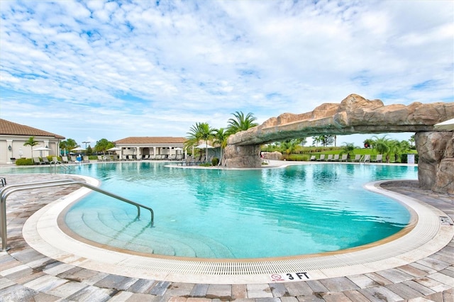 community pool with a patio