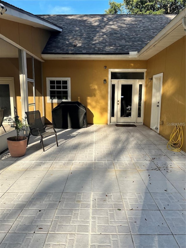 view of patio with a grill