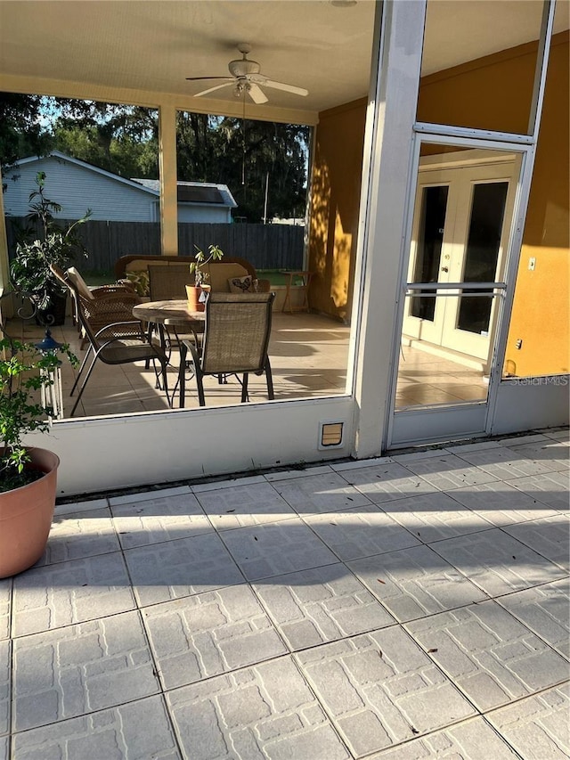 view of patio featuring ceiling fan