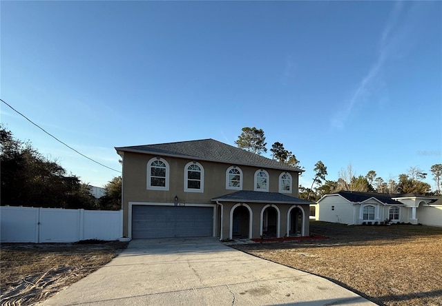 front of property with a garage