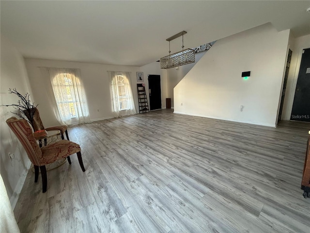 unfurnished living room with hardwood / wood-style floors