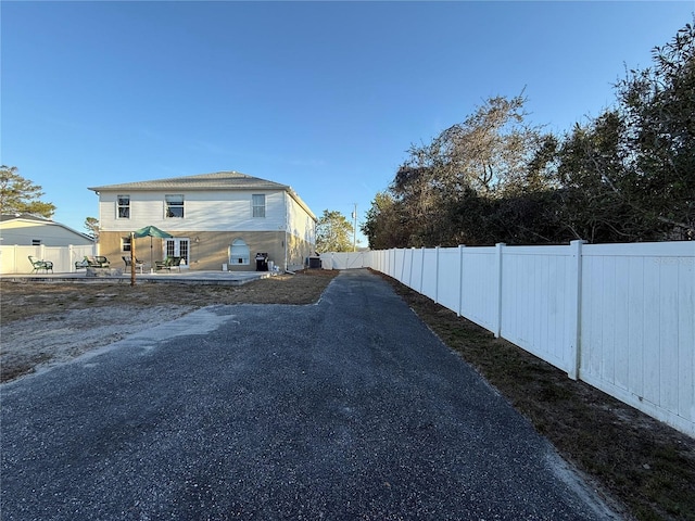 view of home's exterior with a patio