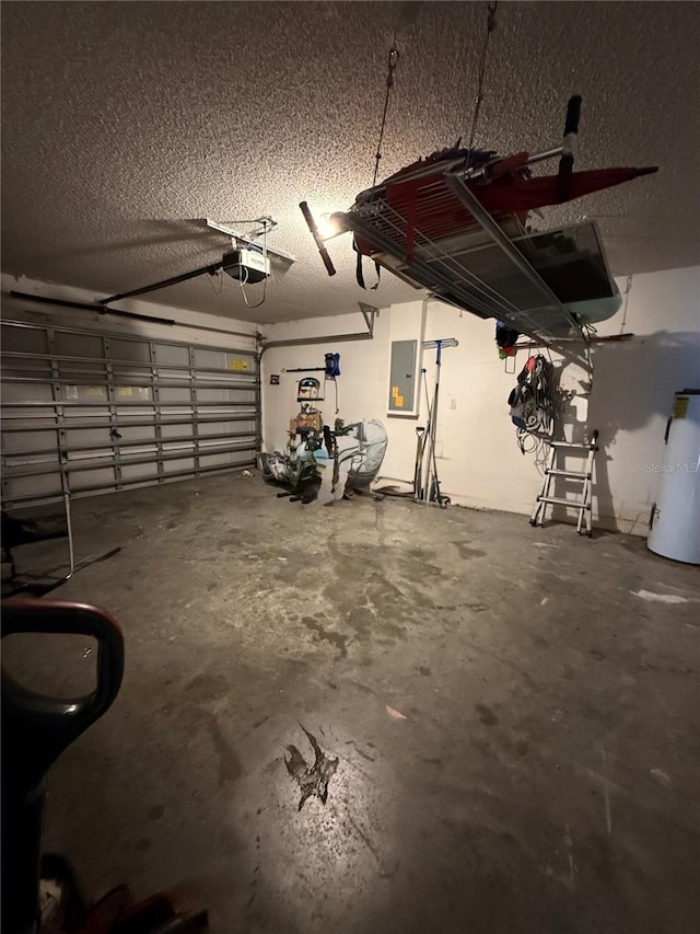 garage with a garage door opener and electric panel