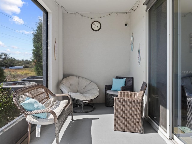 sunroom / solarium featuring plenty of natural light