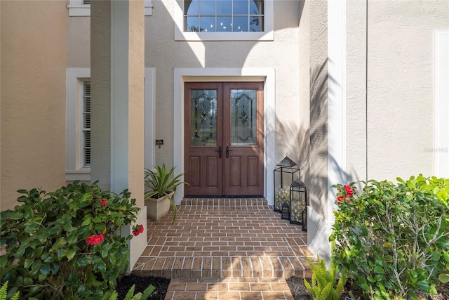 view of exterior entry with french doors