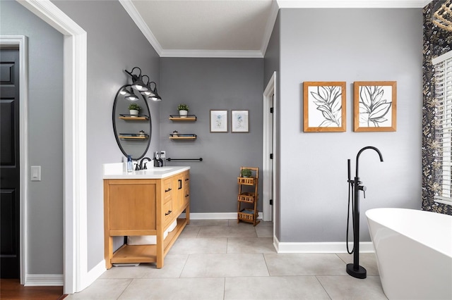 bathroom with ornamental molding, a bath, tile patterned flooring, and vanity