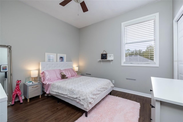 bedroom with dark wood-type flooring and ceiling fan