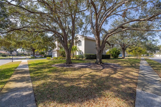 view of front of property with a front lawn