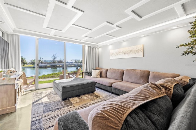 living room with a wall of windows and a water view