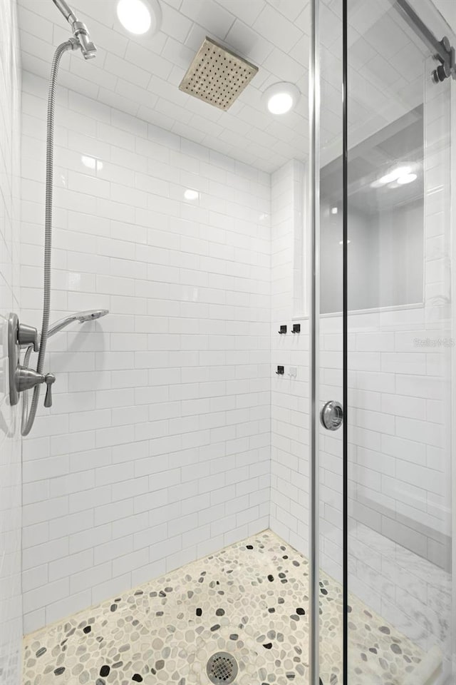 full bathroom with a shower stall