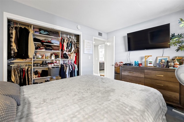 bedroom with visible vents and a closet