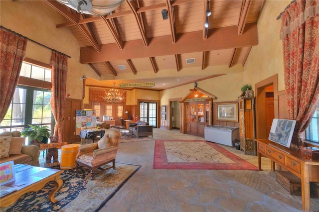 living room featuring high vaulted ceiling, wooden ceiling, and a chandelier