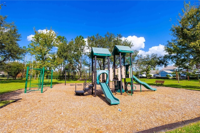 view of playground featuring a lawn