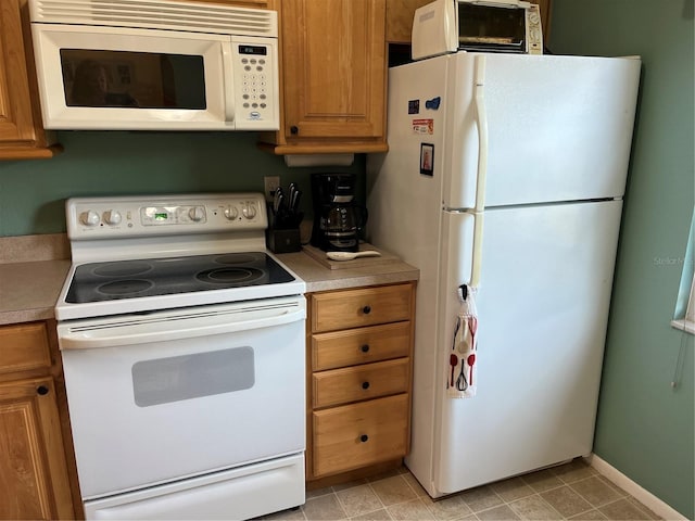 kitchen featuring white appliances