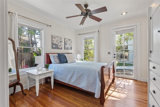 bedroom featuring wood-type flooring, ornamental molding, access to exterior, and ceiling fan