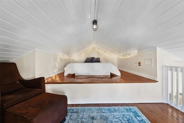 bedroom with vaulted ceiling, crown molding, wood ceiling, and dark hardwood / wood-style flooring