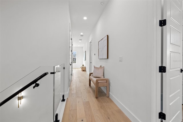 hallway featuring light hardwood / wood-style flooring