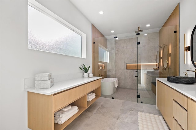 bathroom with vanity and plus walk in shower