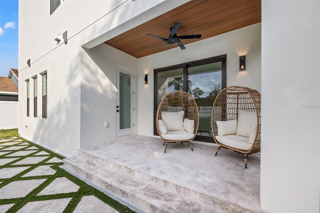 view of patio / terrace featuring ceiling fan