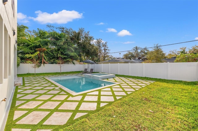 view of pool featuring an in ground hot tub, a yard, and a patio